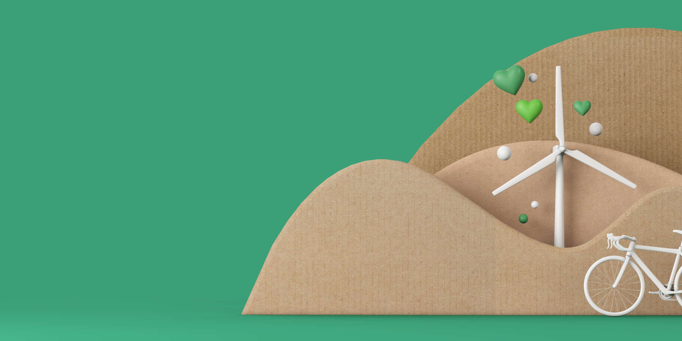 windmolen en fiets in papier symbool voor duurzaamheid